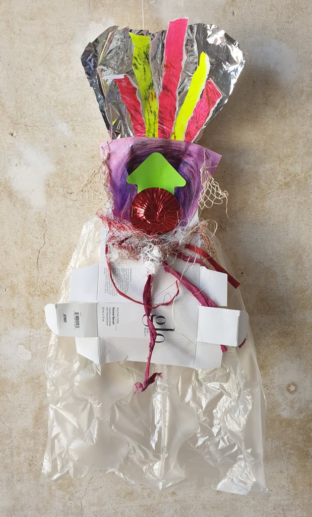 Warrior Woman made out of recycling - Glo