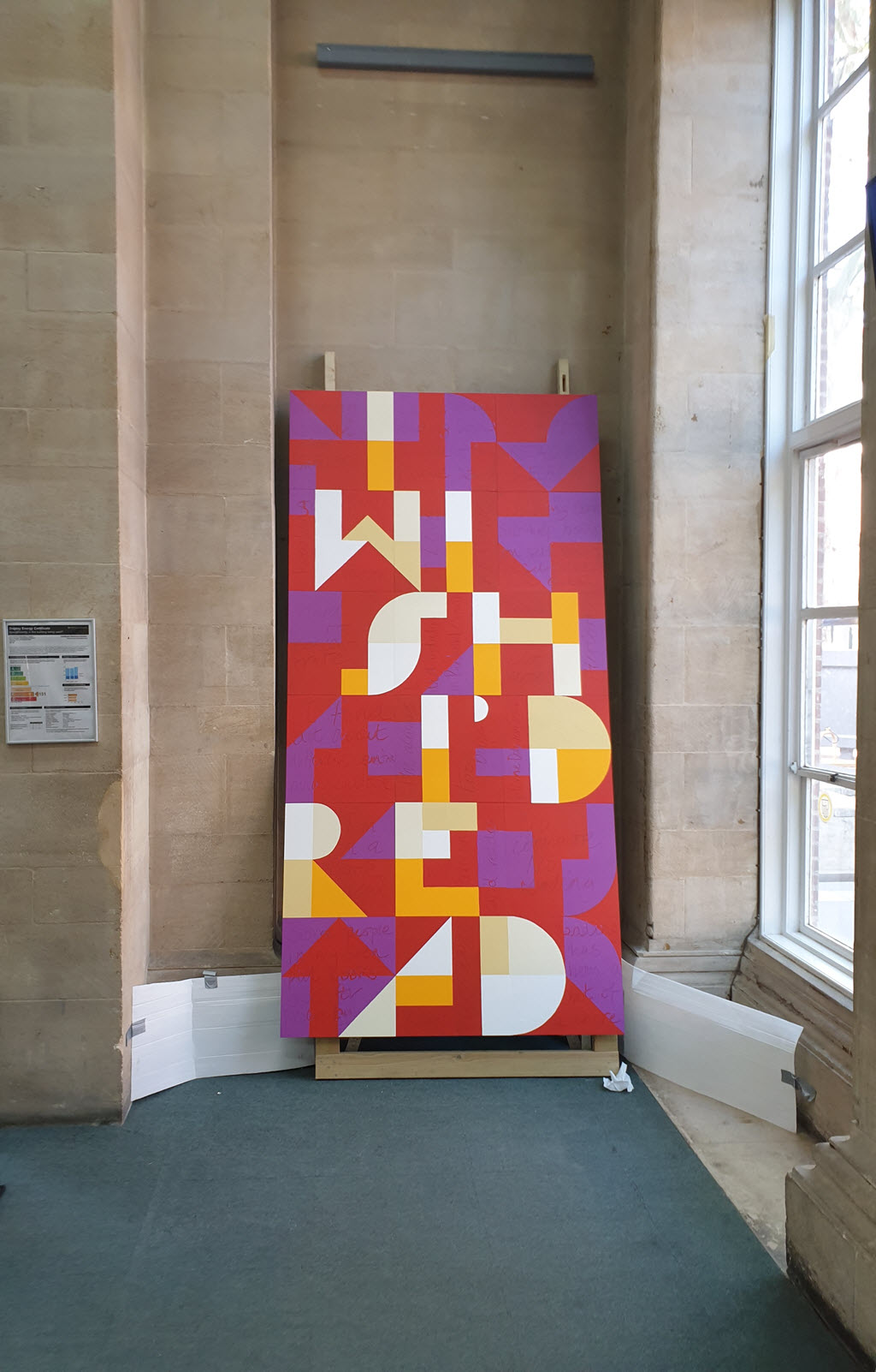 Assembled artwork ready to be lifted into place